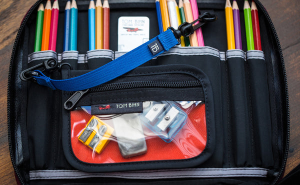 An 8-inch Key Strap attaching a Clear Organizer Pouch to a Freudian Slip.